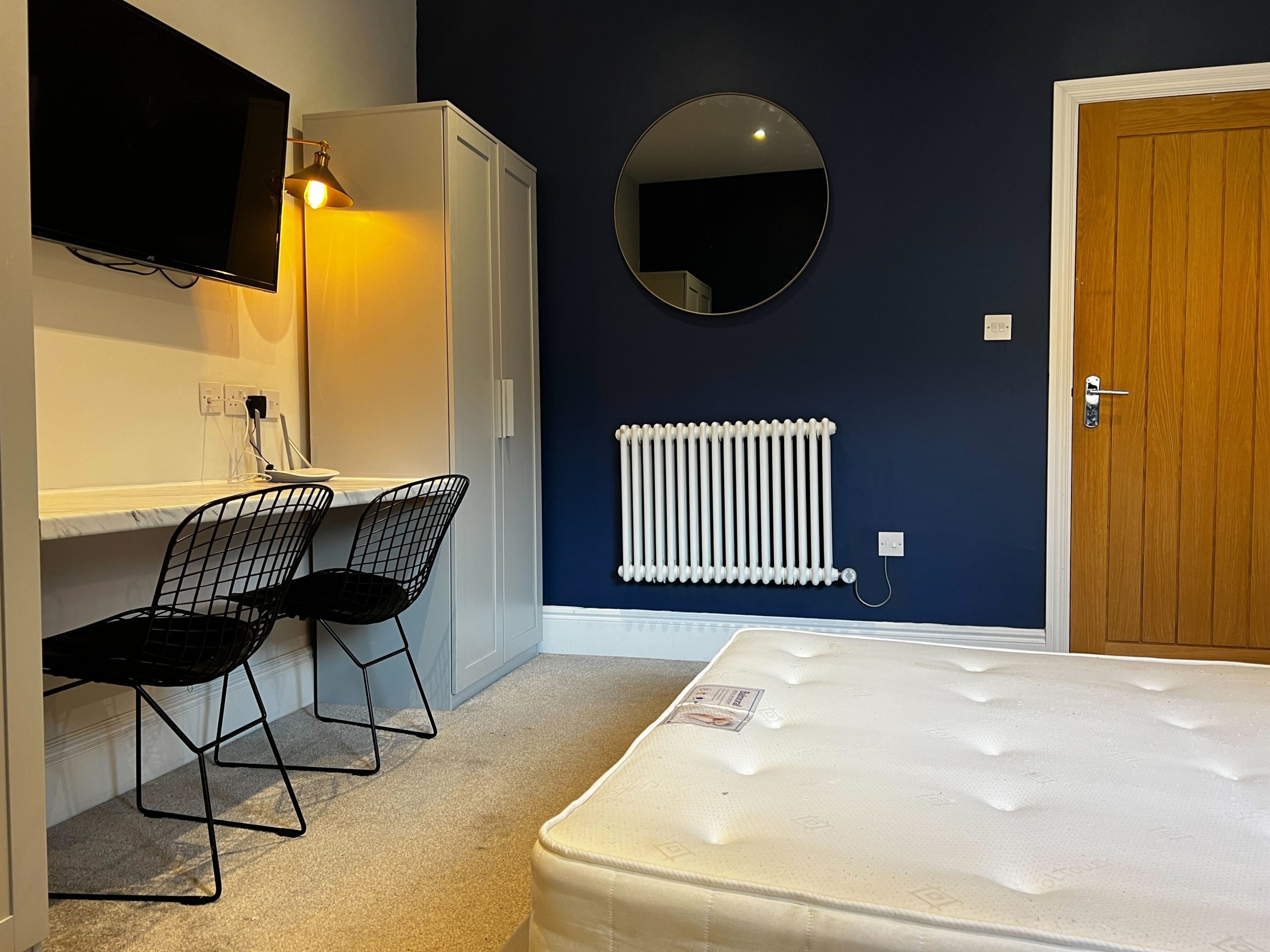 Modern studio with blue accent wall